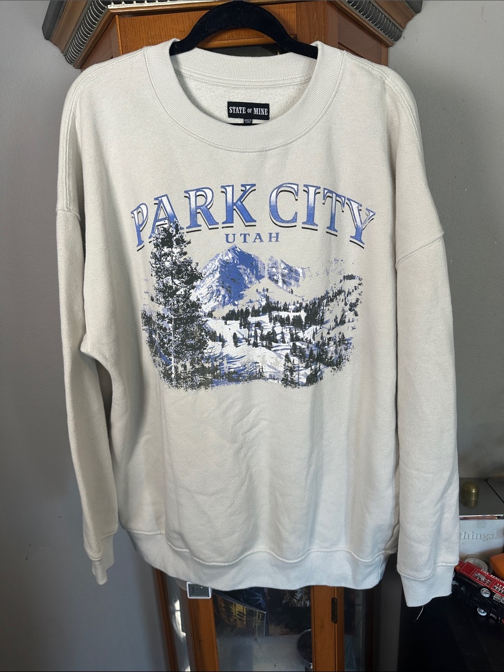 State of Mind Cream Crewneck with Blue Park City Graphic